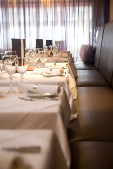 Fine dining table setup and interior design at Zari restaurant.